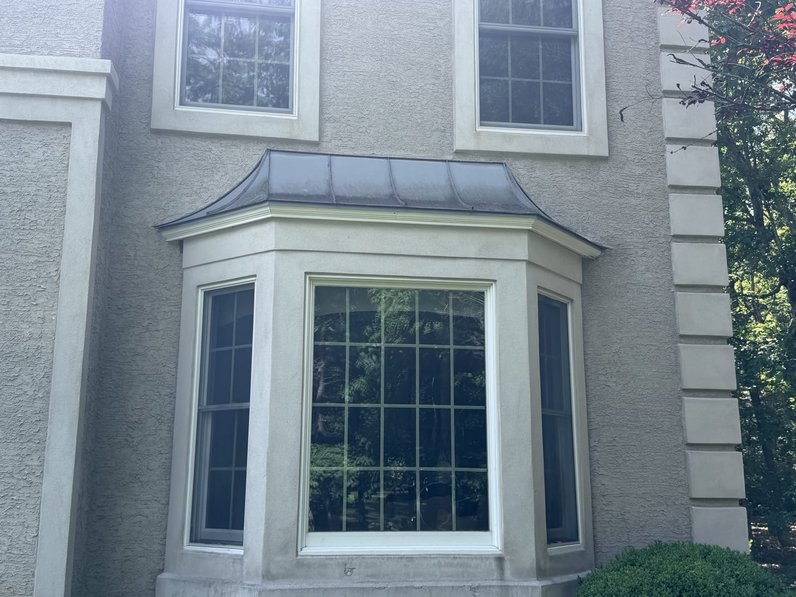 Soft washing before exterior cleaning by Puresplash Services